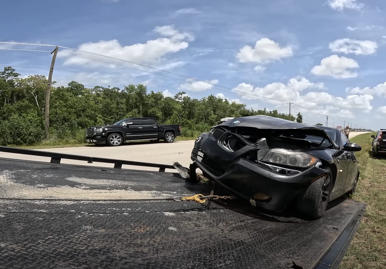 Emergency towing service responding to accident scene